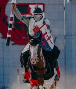 ren faire Ren Faire - a squire riding a horse in a jousting contest